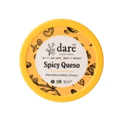 an 8oz package of vegan plant based spicy queso on a white background