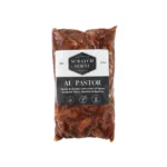a 1lb package of al pastor marinated vegan soy curls by scratch house