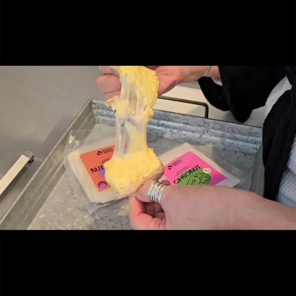 Almond based vegan cheese melted and stretching