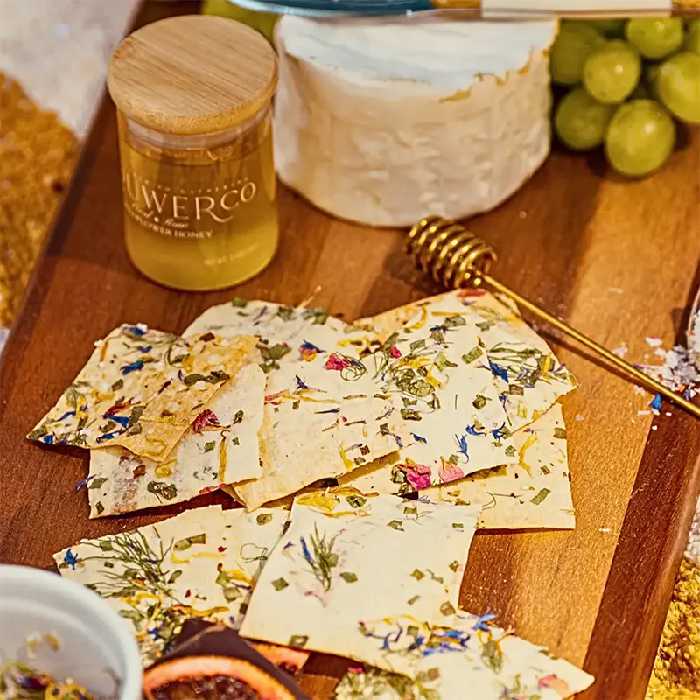 Crackers with edible flowers and herbs baked into them