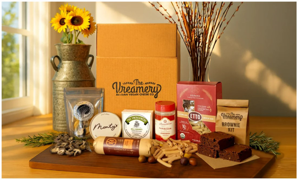 The Vreamery subscription box with mushrooms, pasta, salami, brownies and an assortment of vegan cheeses