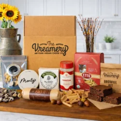 The Vreamery subscription box with mushrooms, pasta, salami, brownies and an assortment of vegan cheeses