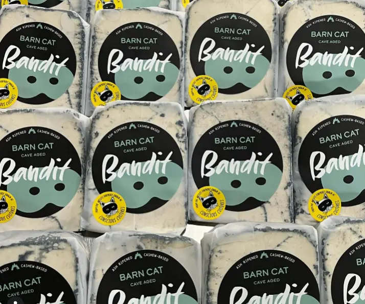 Multiple Barncat Brie cheese lined up