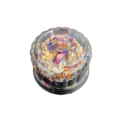 a package of vegan ash rind brie with flowers